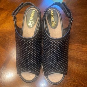 Madeline girl black platform sandals.